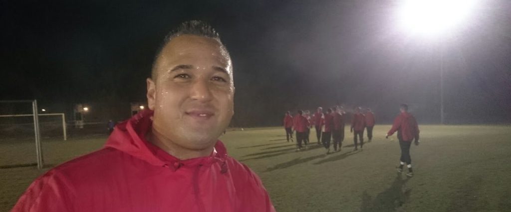 A footballer was left with seven broken teeth after allegedly being punched by a rival assistant manager in the tunnel - with police forced to restore order.