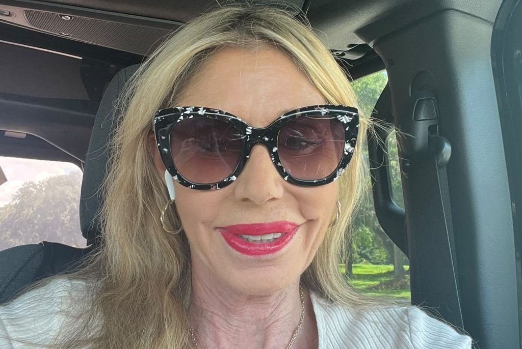 An ex-WWE legend is auctioning off one of her old breast implants for £1,000 - telling fans it is their chance to "hold" her, complete with a certificate.