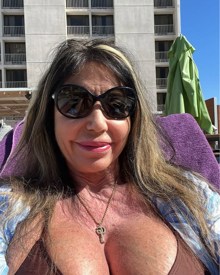 An ex-WWE legend is auctioning off one of her old breast implants for £1,000 - telling fans it is their chance to "hold" her, complete with a certificate.