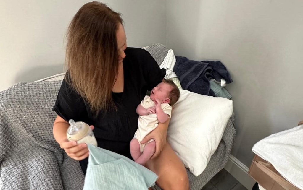 A mum given a 30% survival chance who lost her breasts to cancer says 20 strangers stepped in to feed her miracle IVF baby - her freezer is now overflowing.