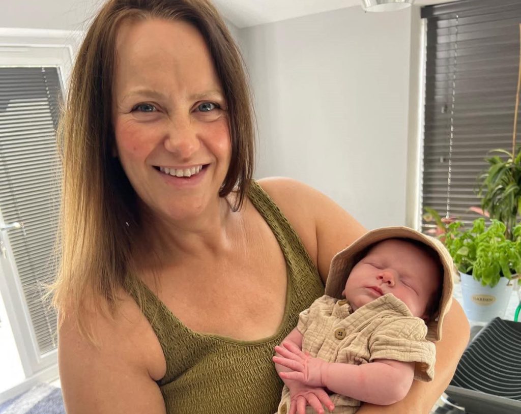 A mum given a 30% survival chance who lost her breasts to cancer says 20 strangers stepped in to feed her miracle IVF baby - her freezer is now overflowing.