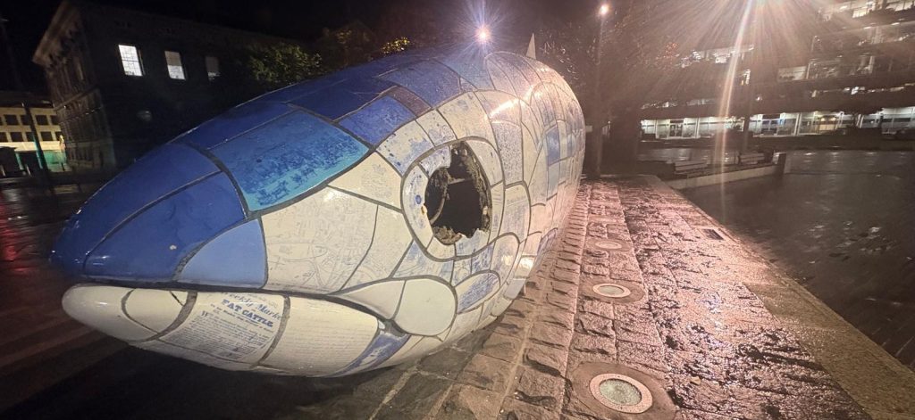 An iconic UK landmark has been left with a gaping hole where its eye should be following an alleged sledgehammer attack - with a man charged over the damage.