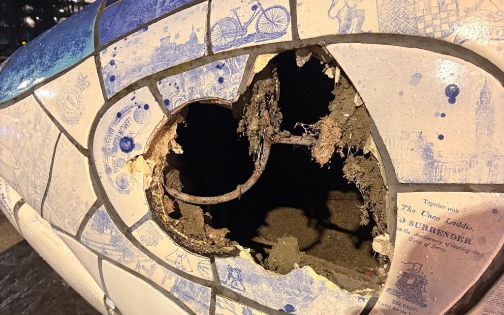 An iconic UK landmark has been left with a gaping hole where its eye should be following an alleged sledgehammer attack - with a man charged over the damage.