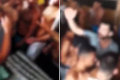 Inmates at a maximum-security prison were filmed celebrating a gang's 33rd anniversary with a cocaine "cake" - drugs officials believe were flown in by drone.