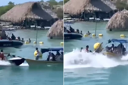 A speeding jet ski smashed into a tourist boat at a packed holiday hotspot, hurling a man overboard in front of stunned onlookers - all caught on camera.