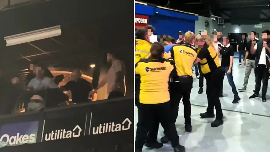 Shocking footage shows a man lying motionless as five men attack him at a Misfits Boxing event - a witness said he feared he would see a murder.