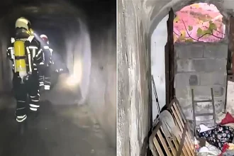 A migrant hideout has been discovered inside a network of abandoned underground military tunnels - after firefighters were alerted to smoke coming from the site.