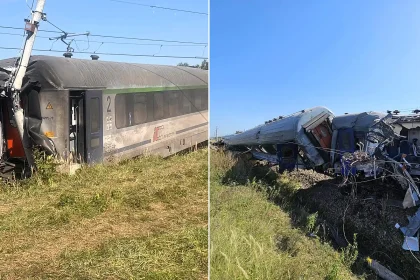 One person has died and 20 were hurt after a concrete mixer smashed into an Intercity train - sending the locomotive and carriages toppling off the tracks.