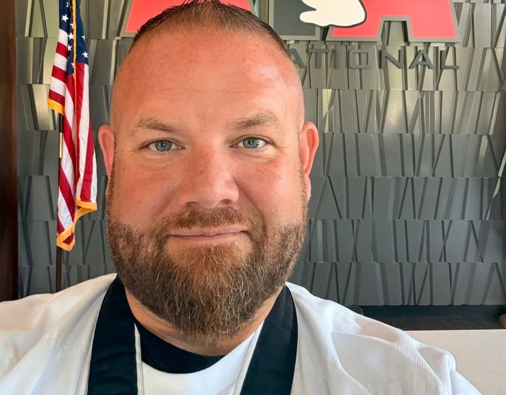 A pilot and father-of-three who vanished in a catastrophic Grand Canyon flash flood has been found dead almost three weeks on, 10 miles downstream.