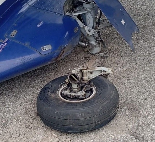 A Sita Air plane lost its rear wheel as it landed at Nepal's remote Juphal Airport, leaving it stranded on the runway - but all 16 people on board escaped unharmed.