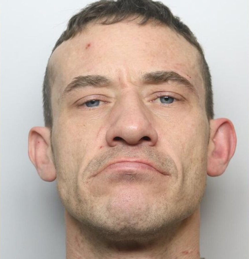 A Range Rover driver has been jailed after dramatic CCTV caught him ramming a car full of people in a pub car park before smashing into a stone building.