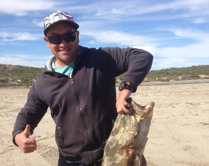 A firefighter mauled by a shark while surfing off Western Australia has been named as Mel Ismail, 50 - he made it back to shore with his arm badly injured.