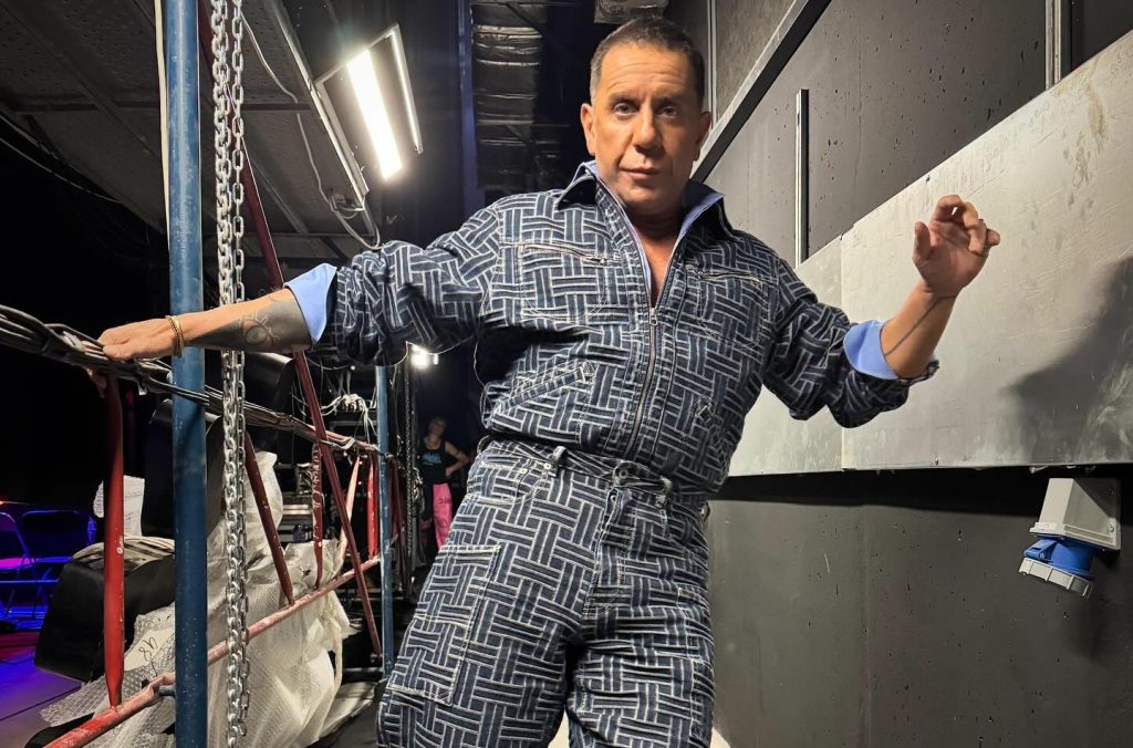 A Greek superstar has died after suffering cardiac arrest during a trendy anti-ageing blood treatment - two doctors have now been charged over his death at 54.