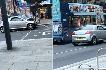 A driver allegedly smashed his car into a bus then tried to flee in the mangled wreckage - crawling away with half his engine destroyed as onlookers hurled coffee at him.