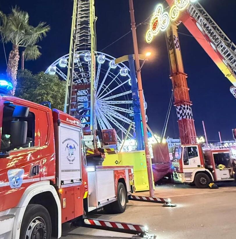 Seven thrill-seekers were left dangling almost 100ft in the air for nearly four hours after a fairground pendulum ride ground to a halt at a packed Spanish fair.