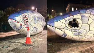 An iconic UK landmark has been left with a gaping hole where its eye should be following an alleged sledgehammer attack - with a man charged over the damage.