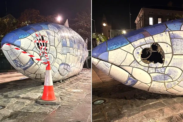 An iconic UK landmark has been left with a gaping hole where its eye should be following an alleged sledgehammer attack - with a man charged over the damage.