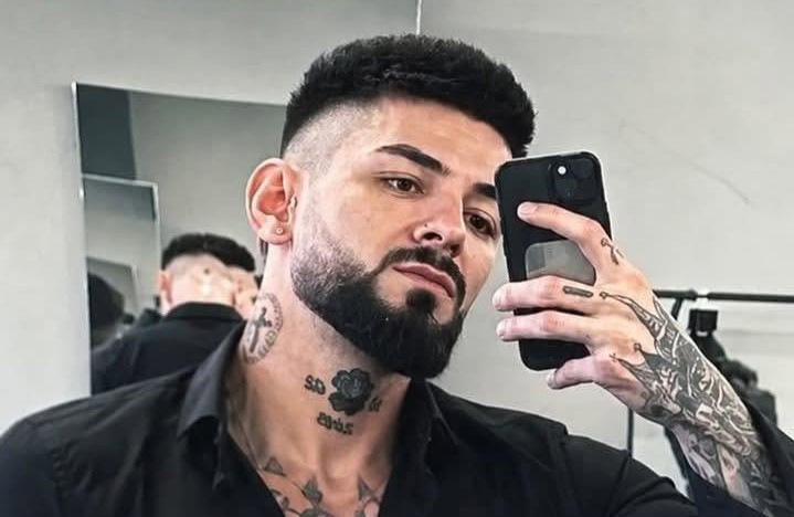 A man suspected of killing his girlfriend and dumping her body in a suitcase in a Romanian river has surrendered to police in Switzerland after allegedly fleeing 700 miles.