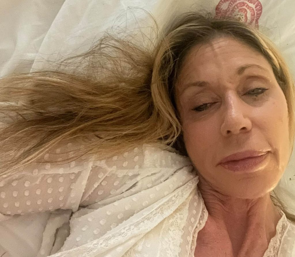 A WWE legend known as the First Lady of Wrestling has sold her old breast implant to a fan for £1,500 after a week-long bidding war - signed and certified.