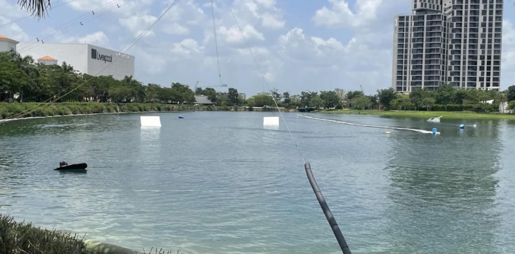 A wakeboard instructor has died after catching a rare brain-eating amoeba at work - traced to an artificial lake at a shopping centre where he taught classes.