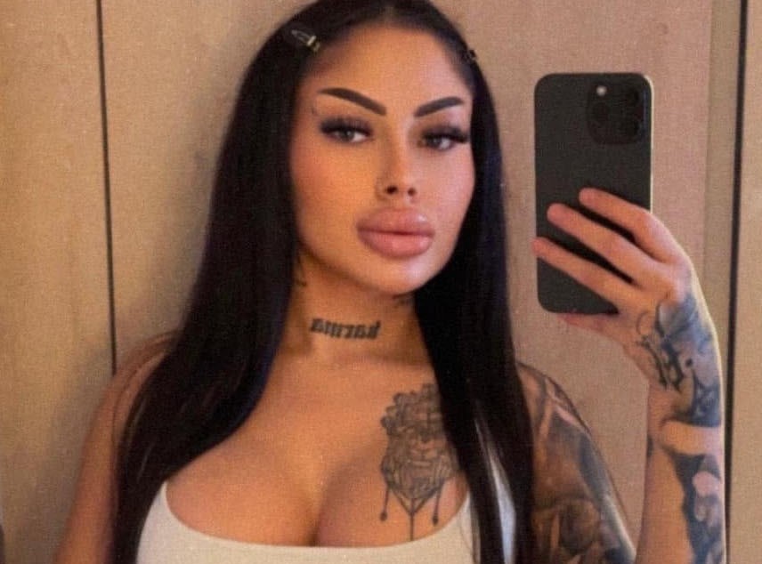 A major police investigation is underway after a 28-year-old hairstylist was found dead inside a suitcase floating in a river - with her boyfriend now on the run.