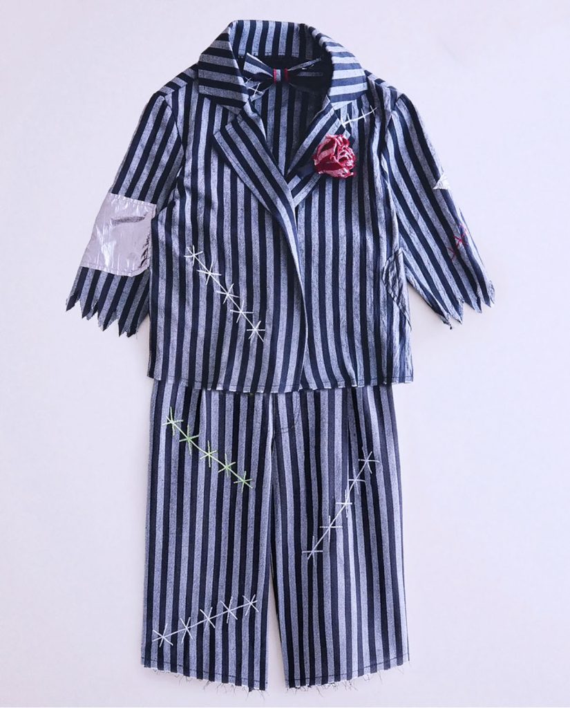 Zara has been slammed over a children's Halloween costume that shoppers claim resembles uniforms worn by Auschwitz prisoners - and it has vanished from its UK website.