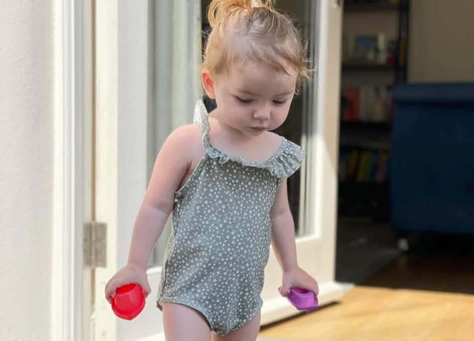 A mum is considering freezing her daughter's eggs after the little girl started puberty at just 10 months old and now needs injections every four weeks.