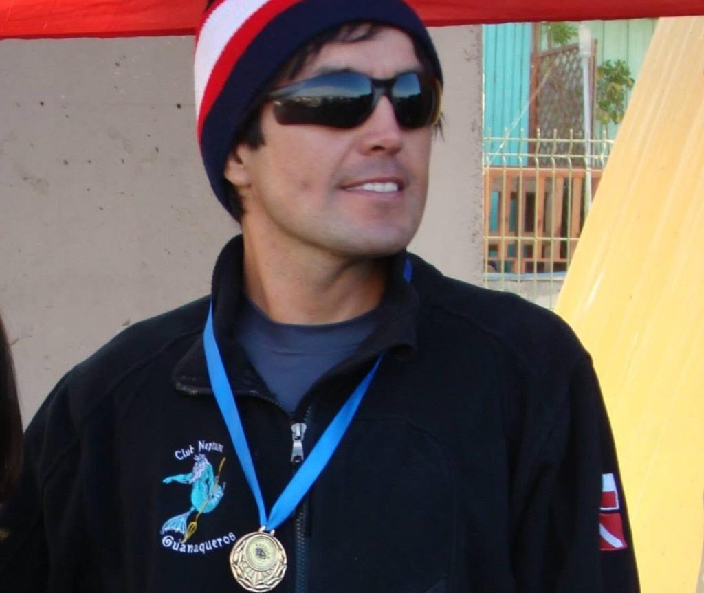 Equipment belonging to a missing spearfishing champion has been found with possible bite marks off Chile - sparking fears he was involved in an incident with sharks.