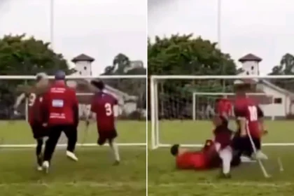 An amputee football match erupted into a violent brawl as players swung their crutches like swords in a wild battle royale.