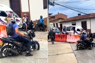 A hapless motorcyclist got himself stuck in wet concrete after ignoring road closure signs and riding straight into a freshly paved road.