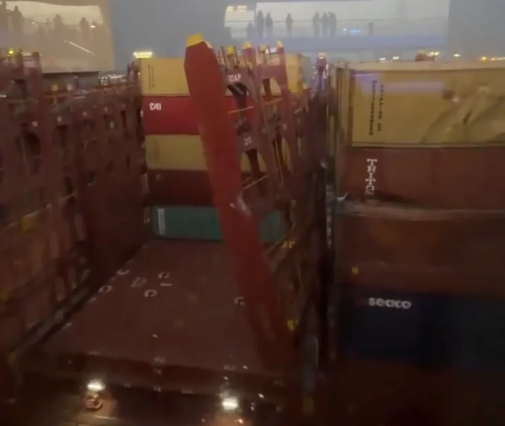 A cruise liner has crashed into container ships during a storm, tearing open a vessel’s hull and leaving passengers shaken.