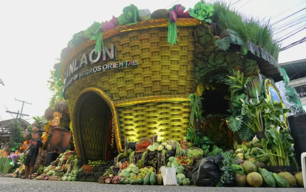 People were forced to jump to safety after a festival booth erupted in flames and left nine attendees injured. The fire broke out at the Canlaon City booth during the.