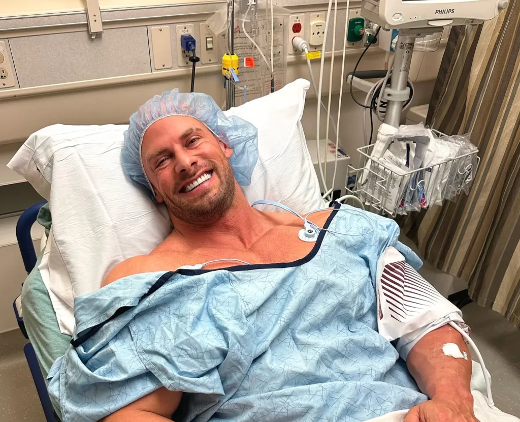 Fitness influencer Joey Swoll, 40, rushed to hospital for heart scare after rough few days - bodybuilder asks fans for prayers as he recovers in hospital bed.