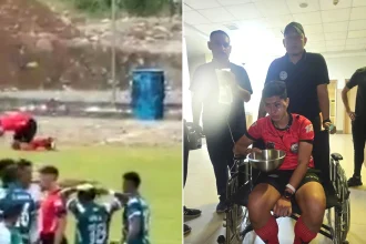 A footballer has been sacked after allegedly hurling a rock at a linesman’s face, leaving him with a fractured cheekbone.