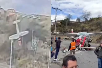 A Cessna plane carrying valuables plunged down an embankment and crashed onto a busy road in Ecuador after overshooting the runway. Both crew members are safe.