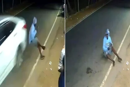 Man checking his phone knocked over and severely injured after speeding car sweeps motorbike from under him in India. Shocking CCTV footage captured the horrific collision.