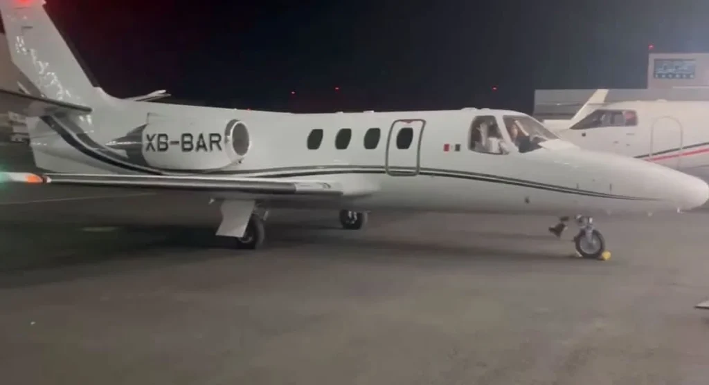 Investigators probe whether Mexican plane crash that killed two pilots was deliberate attack linked to narco gang monitoring governor's flights.