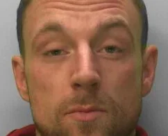 Prolific shoplifter Dale Searle jailed for two years after £6,800 crime spree across Worthing stores. Previously held gun to shop worker's head during robbery.