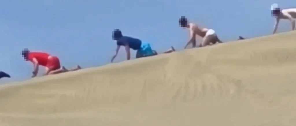 A “puppy parade” organiser faces a fine after kinksters were seen crawling across a protected sand dune. Legal proceedings have been issued against a kinky community.