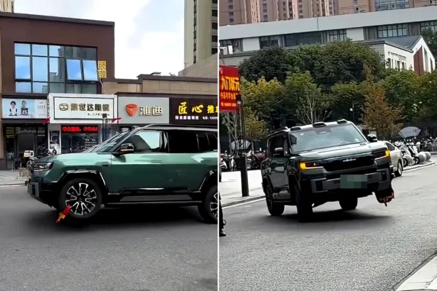 A sneaky driver used a high-tech suspension to lift a clamped wheel and drive off on the other three. Footage shows the BYD Denza B8 SUV rolling down a busy commercial.