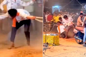 Performer strangled by ropes attached to motorbikes in shocking stunt gone wrong - dramatic footage shows the horrifying incident at Indian event.