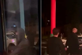 Residents attacked with hammers while defending cars from masked thugs in France. Shocking footage shows violence during christening celebration. Investigation underway.