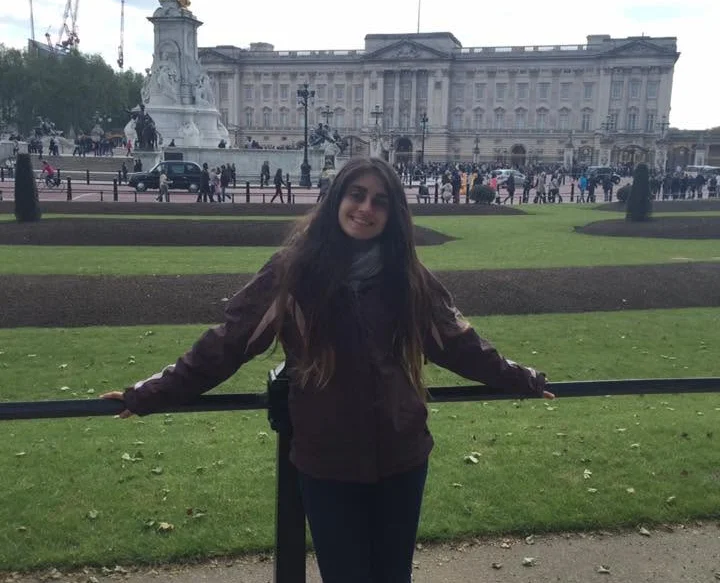 A tourist plunged hundreds of metres to her death after reportedly stepping away from a mountain path to take a photograph.