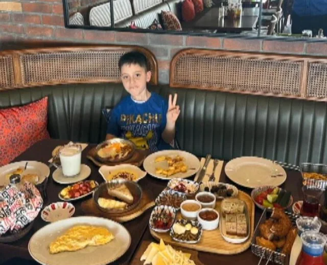 Eight-year-old boy dies after uncle allegedly throws him from sixth-floor window in Istanbul over a dispute about crisps. Uncle denies intentional murder.