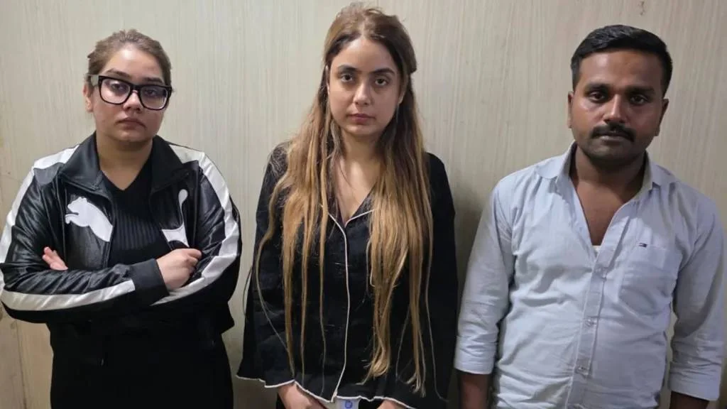 A model accused of murdering her businessman boyfriend has been arrested after an 11-day manhunt, having allegedly fled across borders and worn a burqa to evade police.