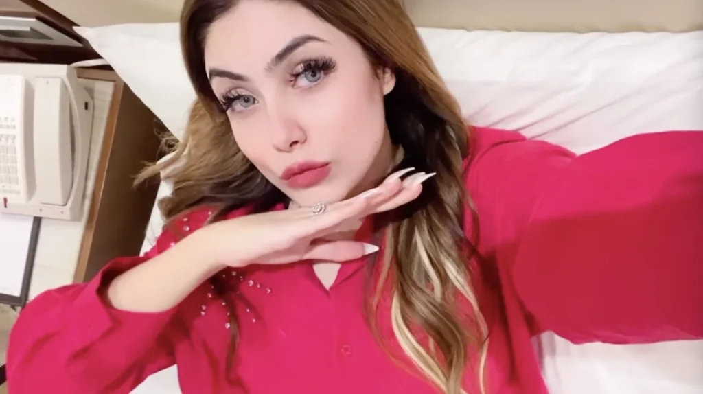 A model accused of murdering her businessman boyfriend has been arrested after an 11-day manhunt, having allegedly fled across borders and worn a burqa to evade police.